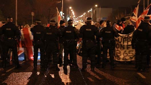 Man arrested after tagging HIMSELF in photos during Belfast riots