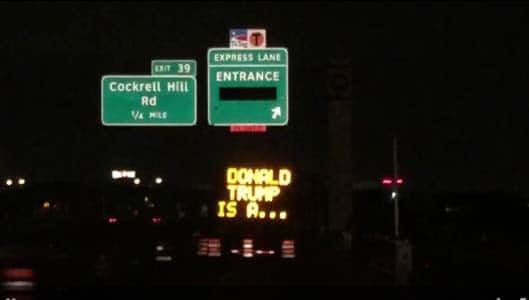 Hacked road sign calls Donald Trump a “shape shifting lizard”
