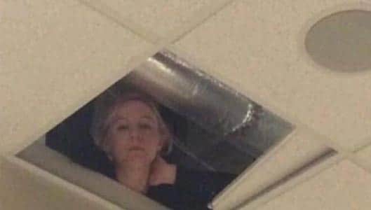 Fake photo claims to show teacher in ceiling spying on students taking test