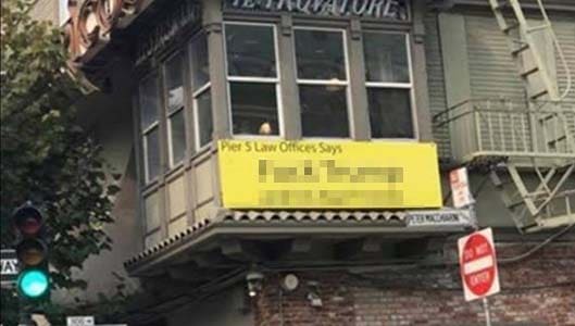 Offensive Trump sign in law office window? It’s real