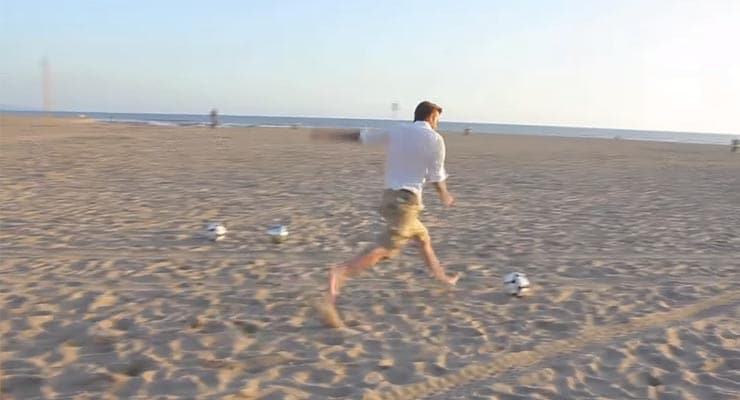 Did David Beckham sink 3 balls into 3 trash cans on a beach?