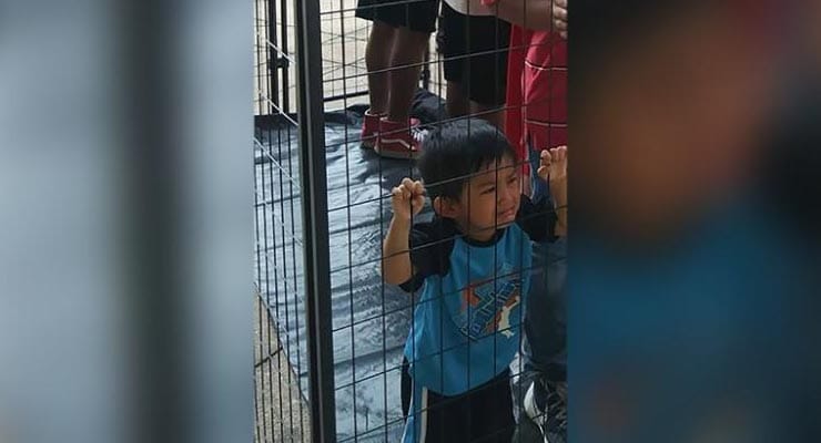 Mis-captioned photo of crying child in cage spreads online