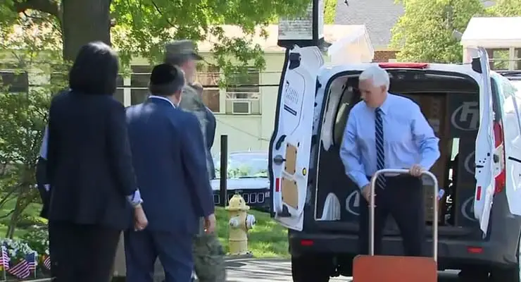 Does video show Mike Pence carrying empty PPE boxes for PR stunt? Fact Check