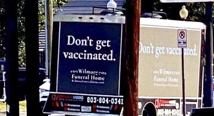 Is image of funeral home van with anti-vaccine message real? Fact Check